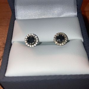 White and black Diamond halo earrings in 14kt white gold. (Screw on back)